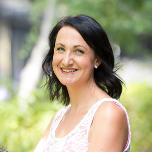 Jane Tiller smiling with trees in background