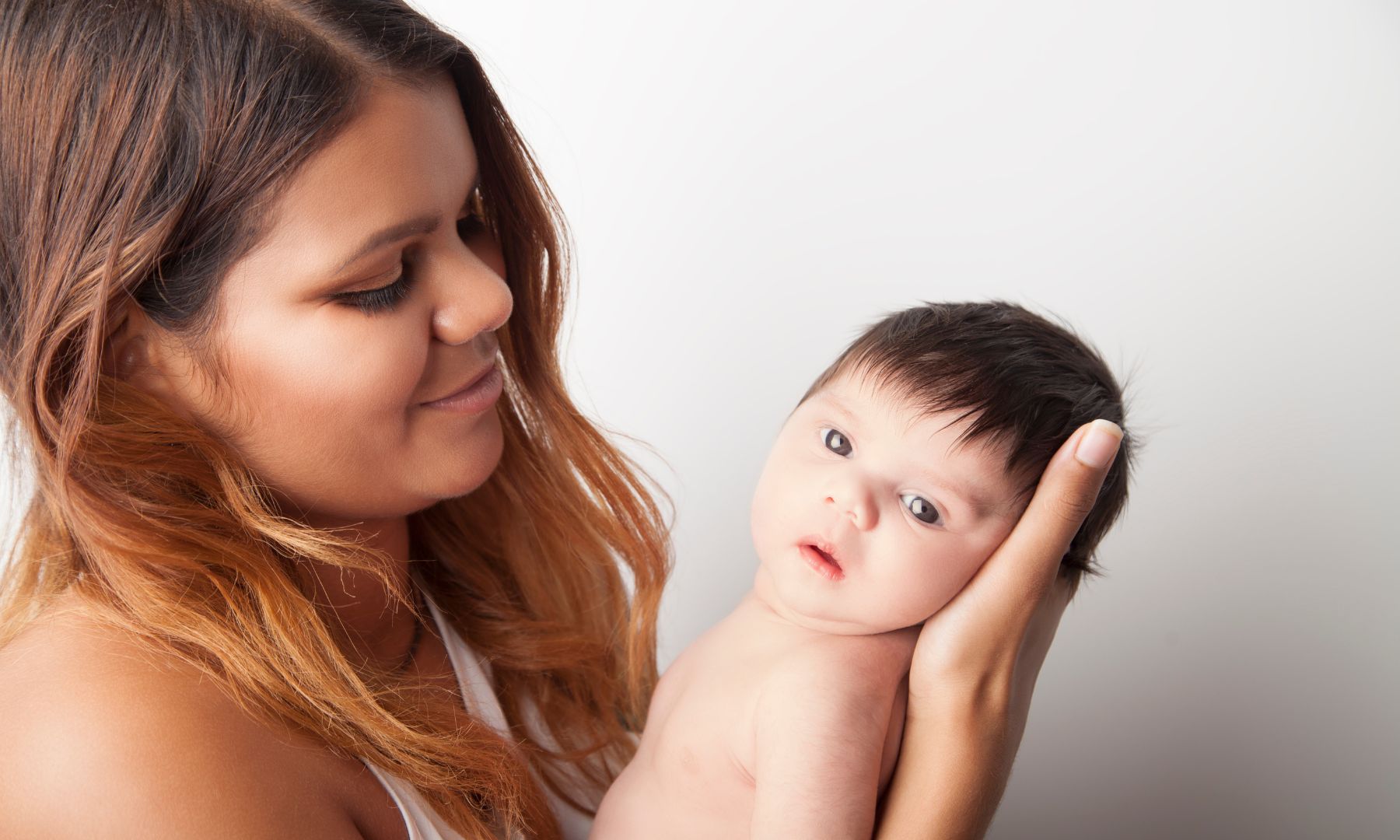 Aboriginal mother holding baby