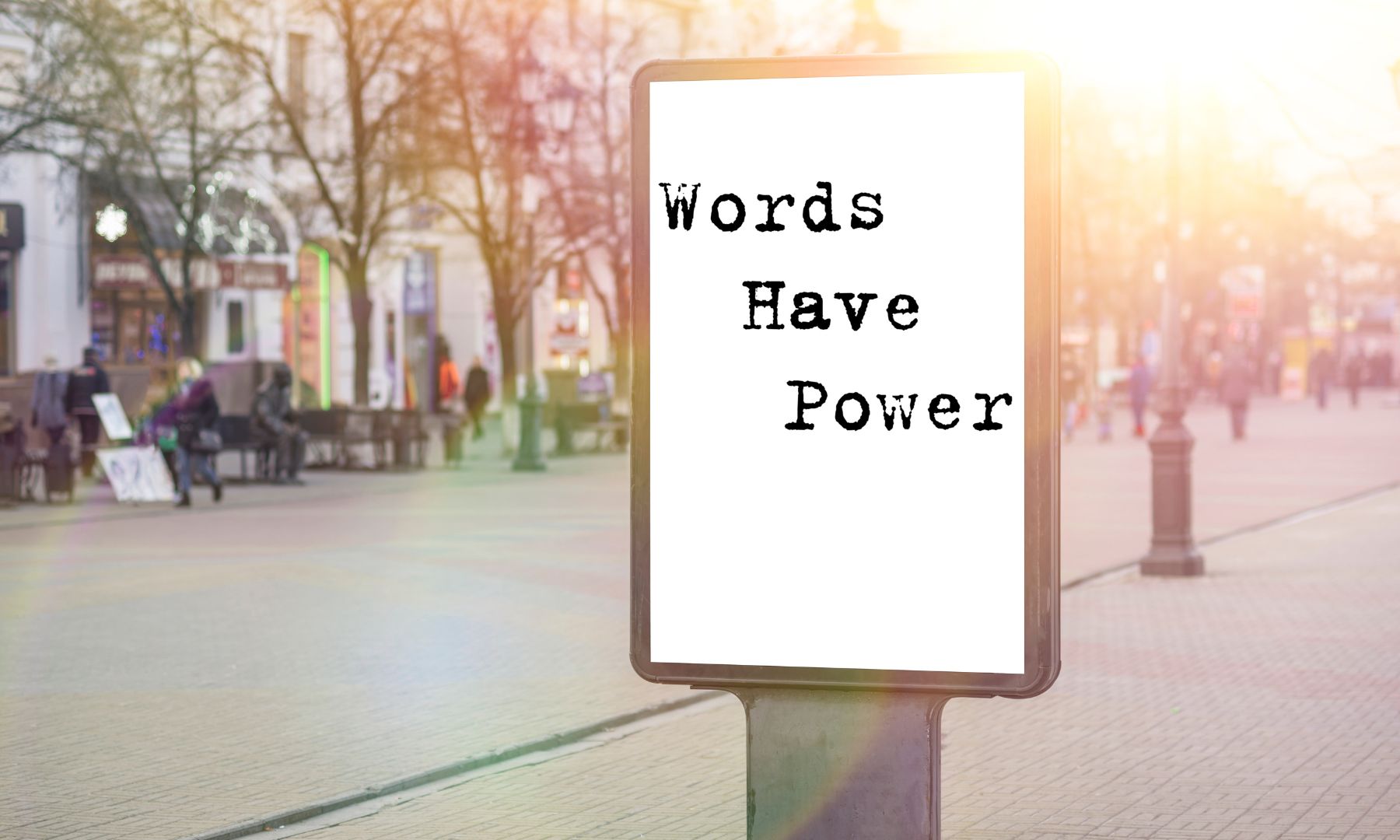 Image of a sign that says 'words have power'